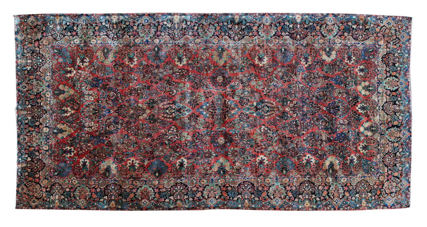 A Tabriz Wool Rug 19 feet 1/2 inches x 10 feet 2 inches.
