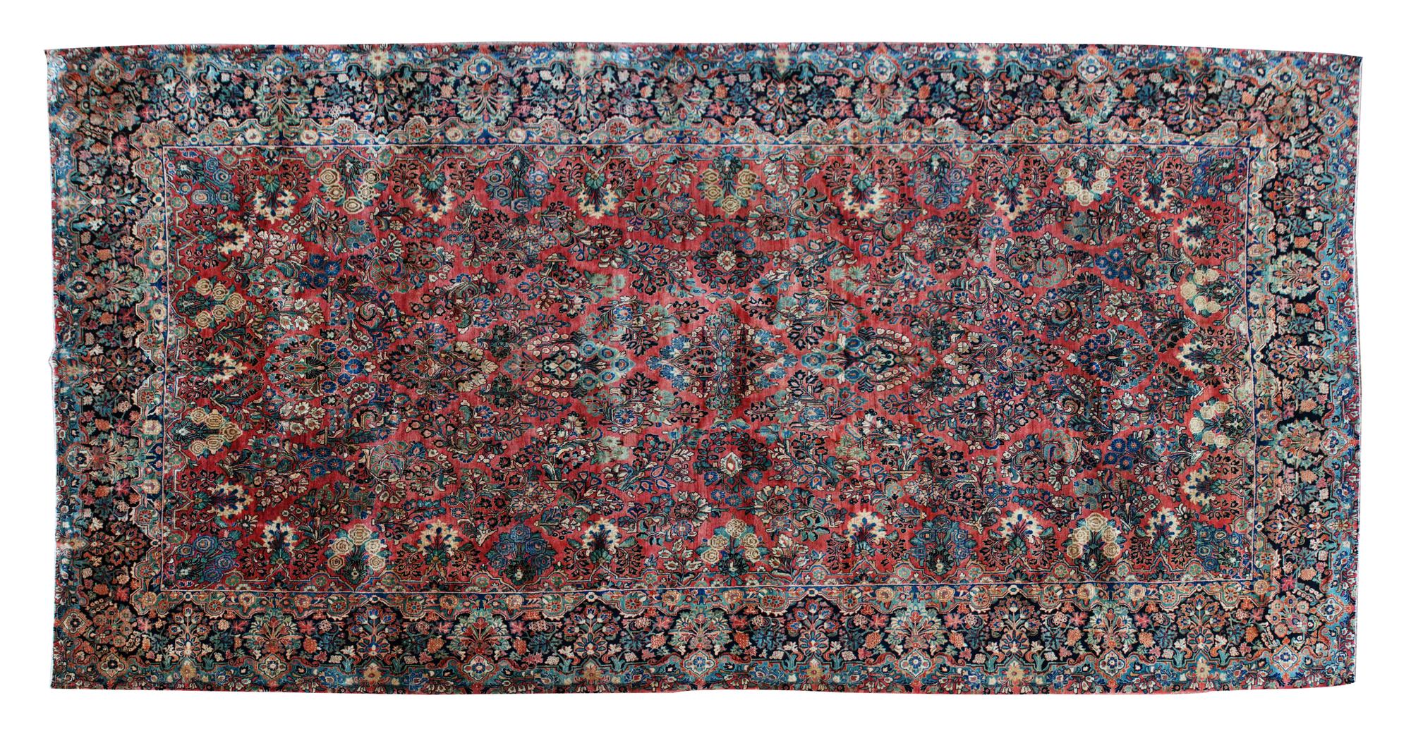 A Tabriz Wool Rug 19 feet 1/2 inches x 10 feet 2 inches.