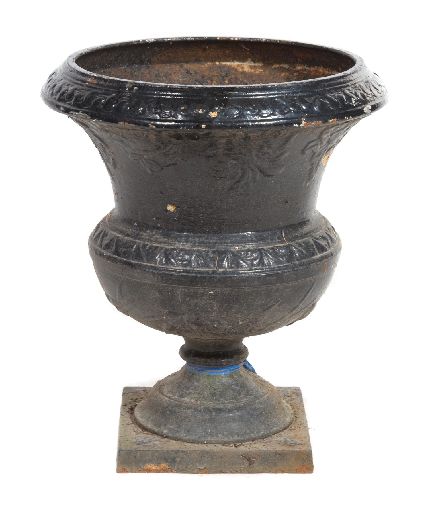 A Victorian Painted Iron Garden Urn Height 24 inches.