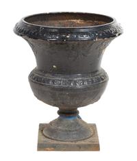 A Victorian Painted Iron Garden Urn Height 24 inches.
