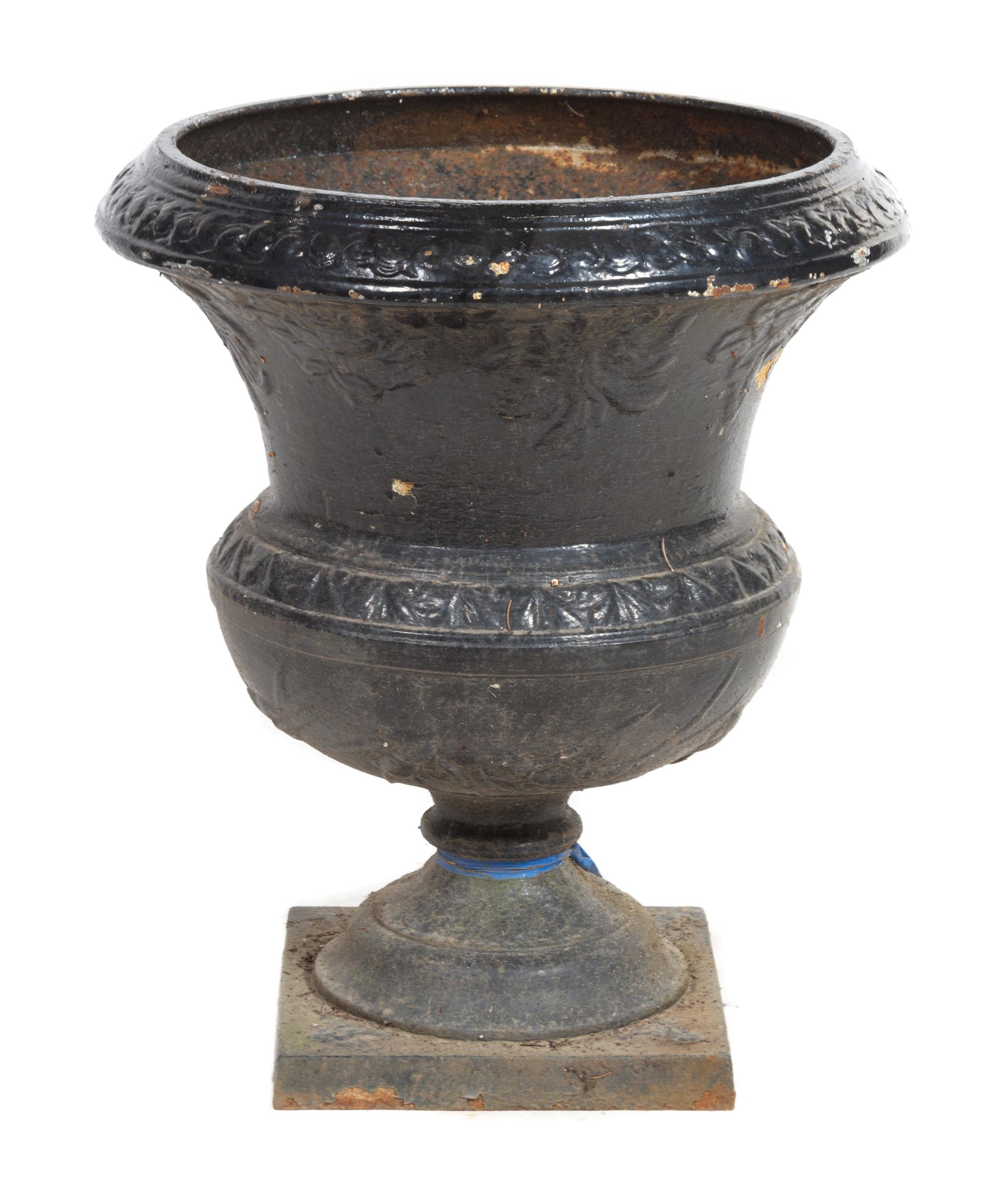 A Victorian Painted Iron Garden Urn Height 24 inches.