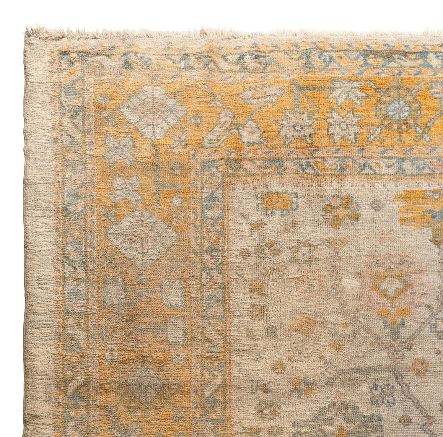 An Oushak Wool Rug