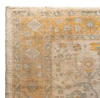 An Oushak Wool Rug