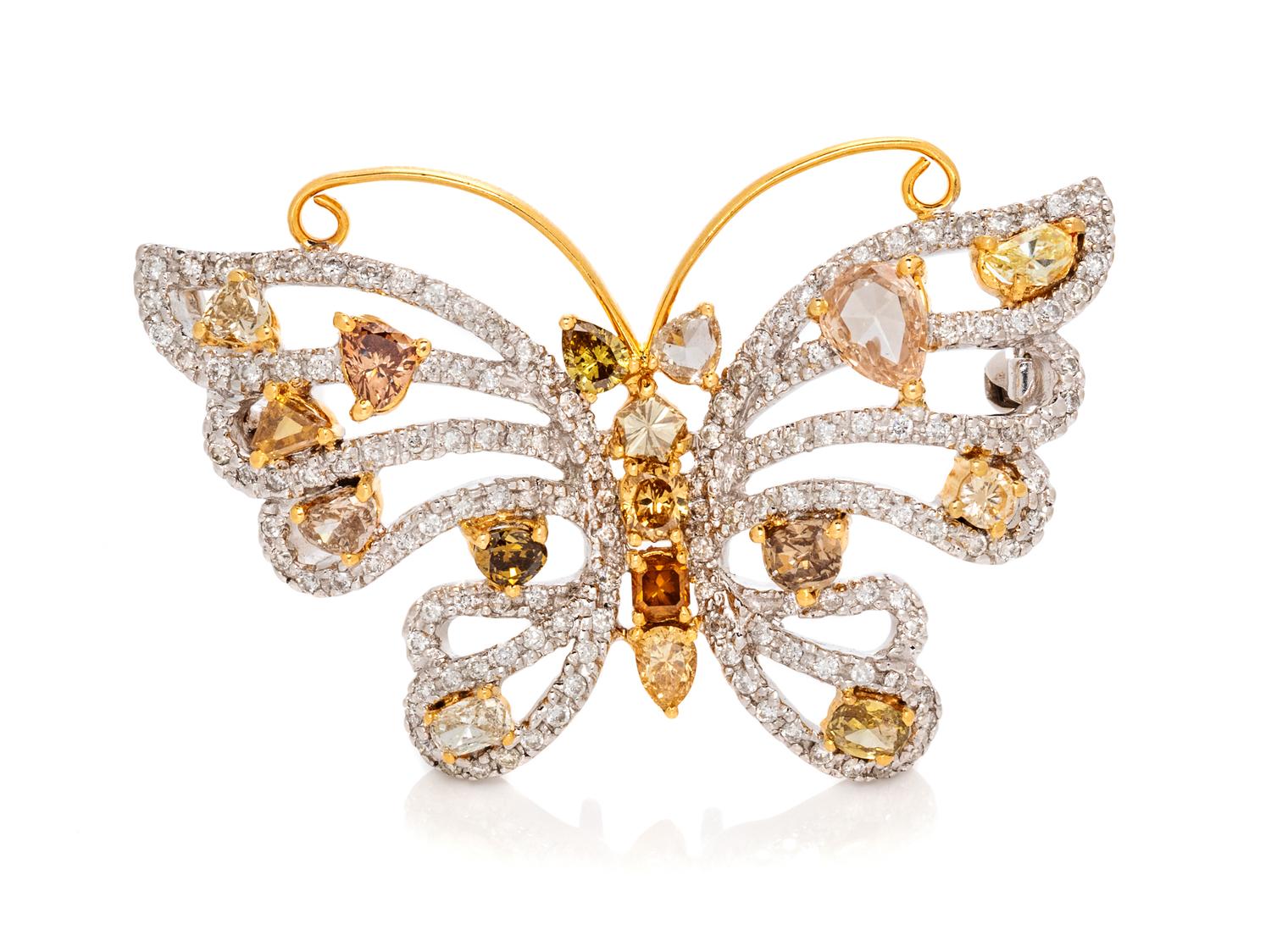 An 18 Karat Bicolor Gold, Diamond and Colored Diamond Butterfly Pendant/Brooch, 8.20 dwts.