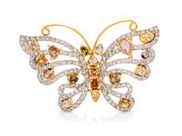 An 18 Karat Bicolor Gold, Diamond and Colored Diamond Butterfly Pendant/Brooch, 8.20 dwts.
