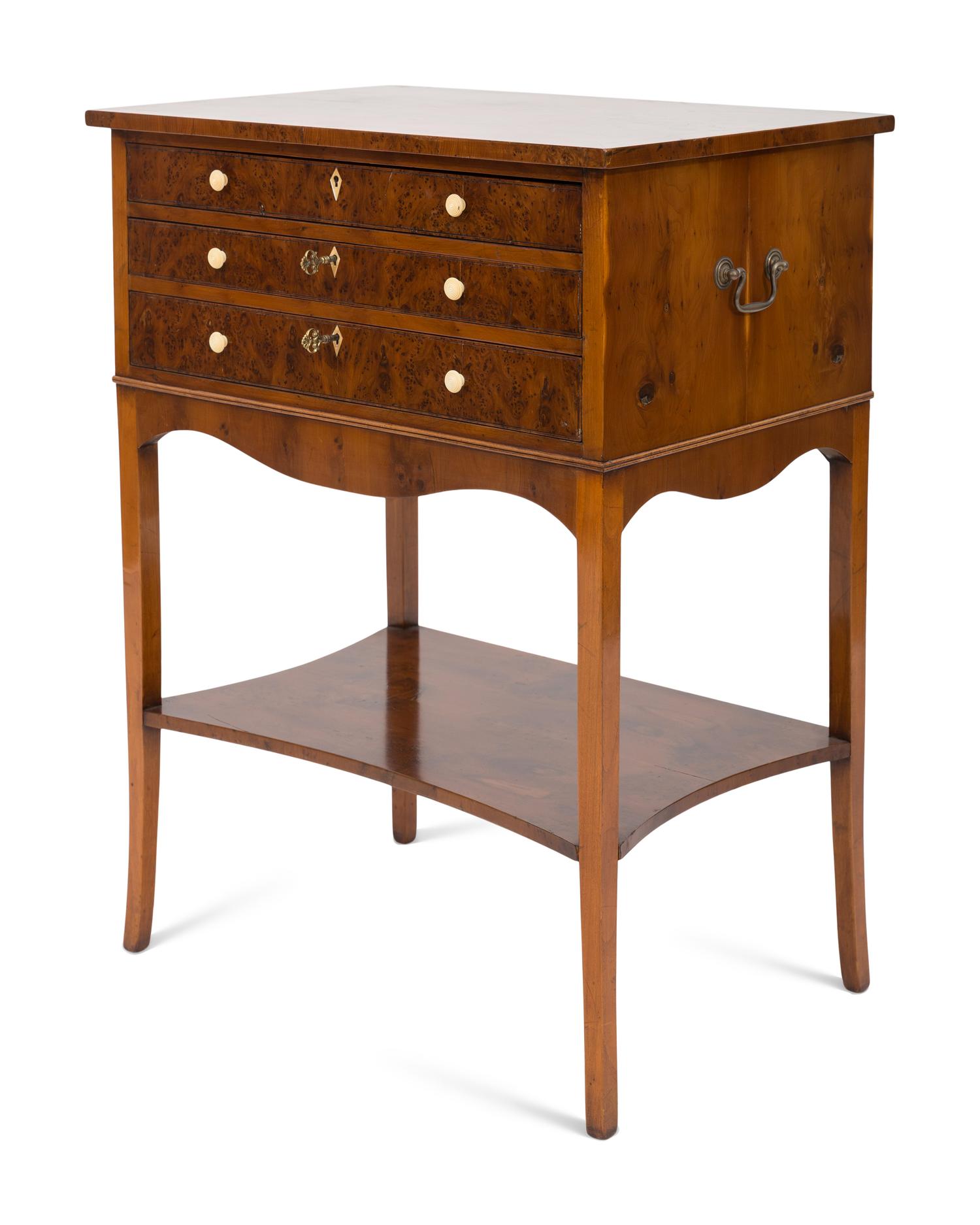 A Regency Style Titchmarsh and Goodwin Burl Walnut Work Table