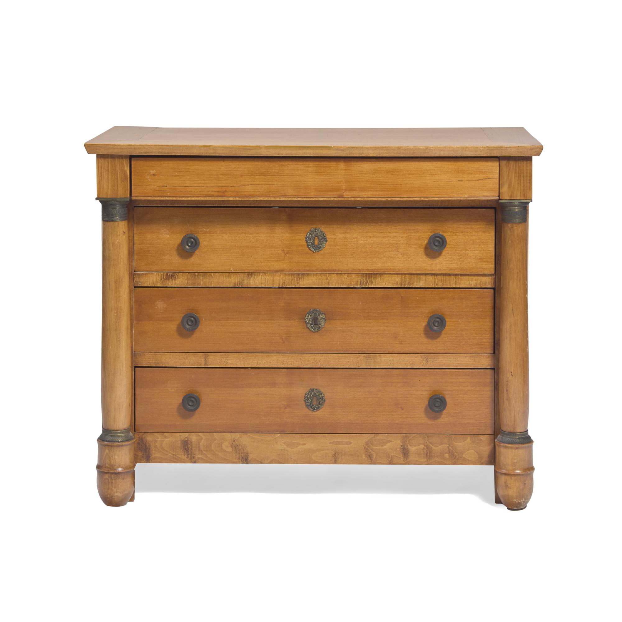 An Empire Fruitwood, Beechwood and Gilt-Metal Mounted Chest of Drawers