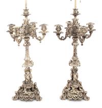 A Pair of Silvered Cast Metal Candelabra Mounted as Lamps