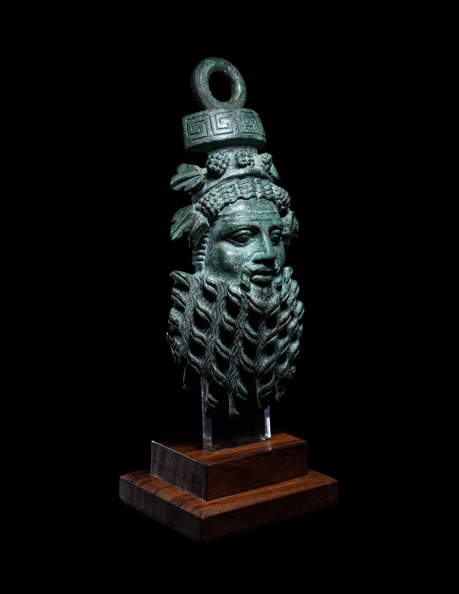 A Roman Bronze Applique Mask in the Form of Silenus