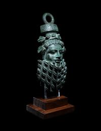 A Roman Bronze Applique Mask in the Form of Silenus