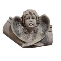 A Carved Limestone Angel from a Chicago, IL. Church 34" W x 17" D X 23" H — United States, 20th Century