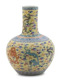 A Chinese Export Famille Jaune Porcelain Bottle Vase