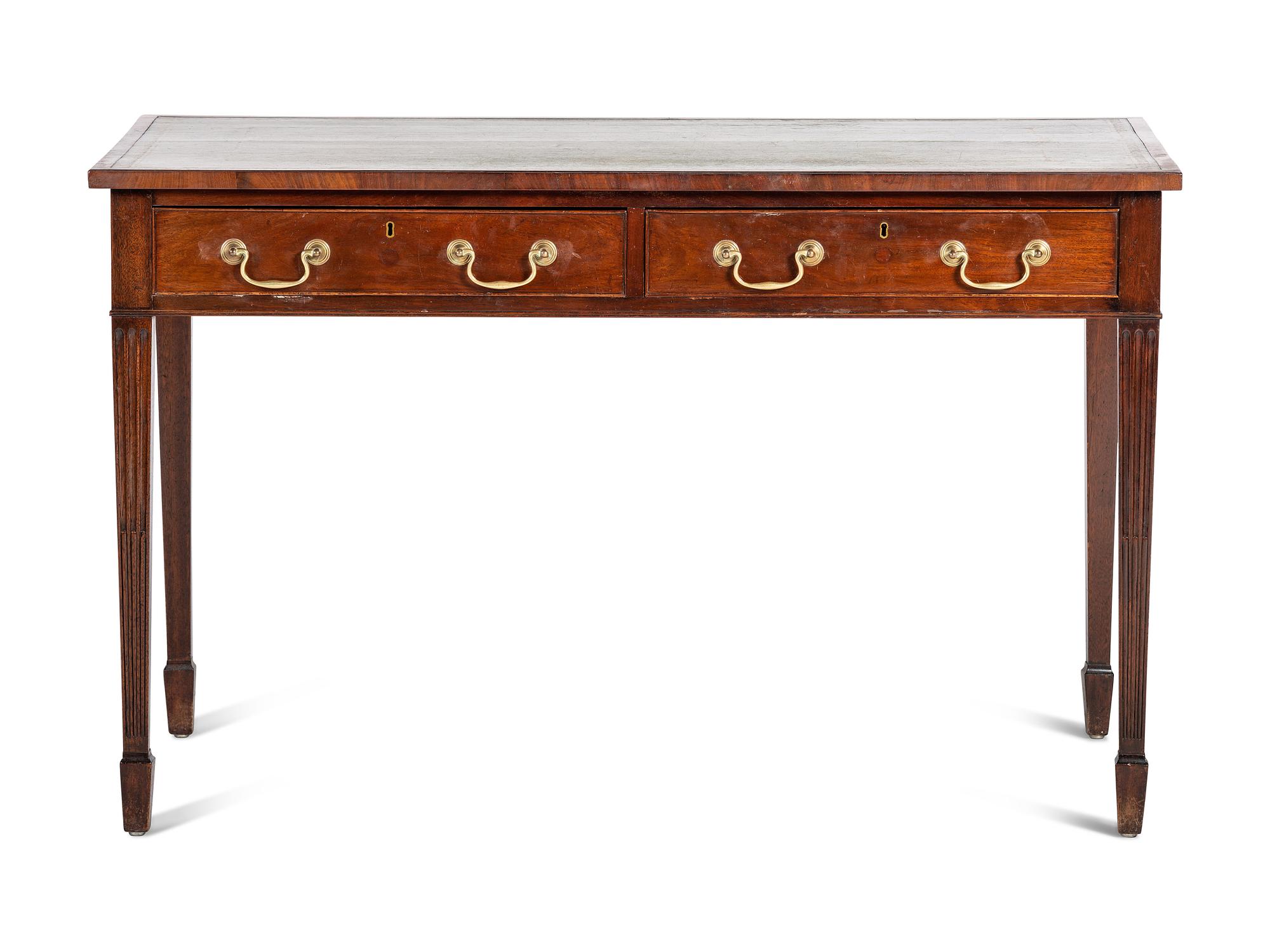 An English Mahogany Leather Inset Writing Table
