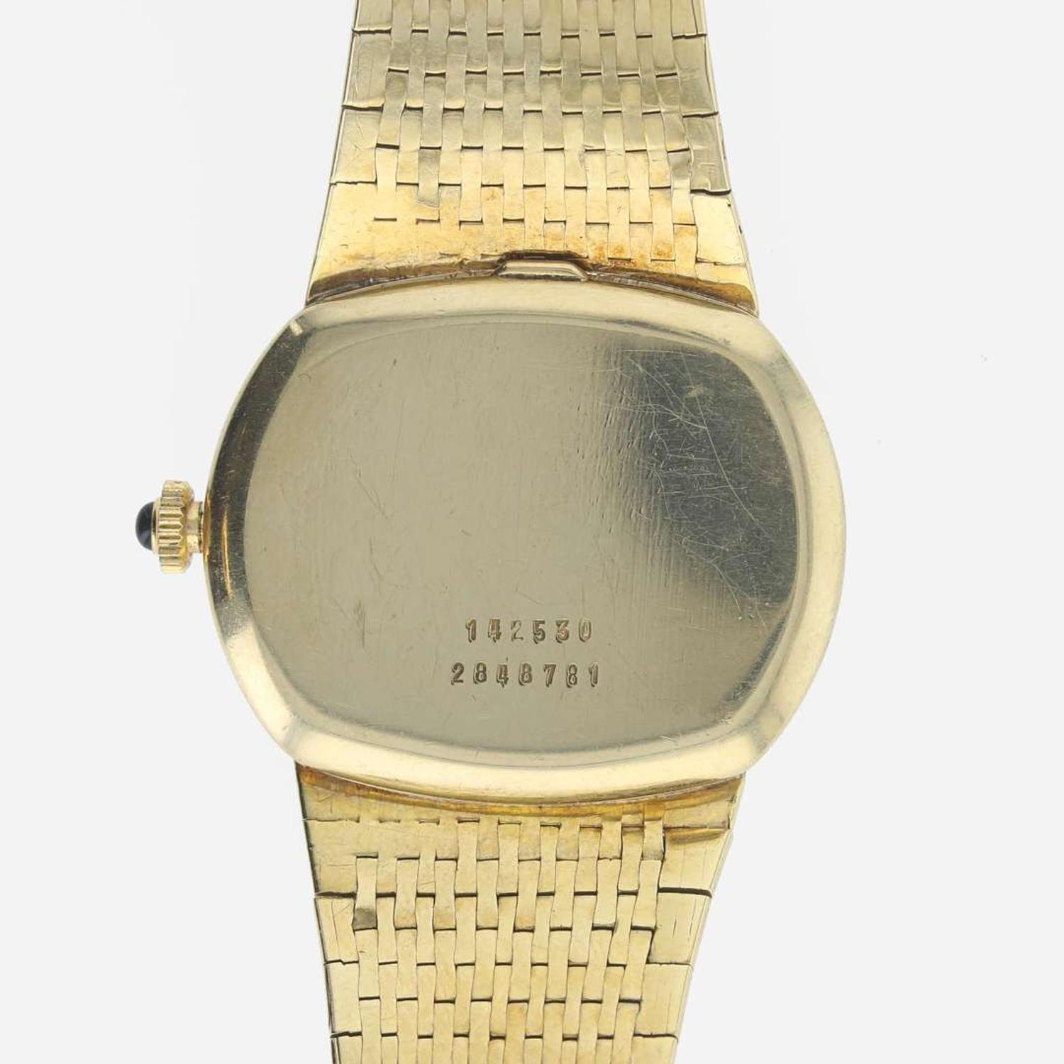 A 14K yellow gold wristwatch, Universal