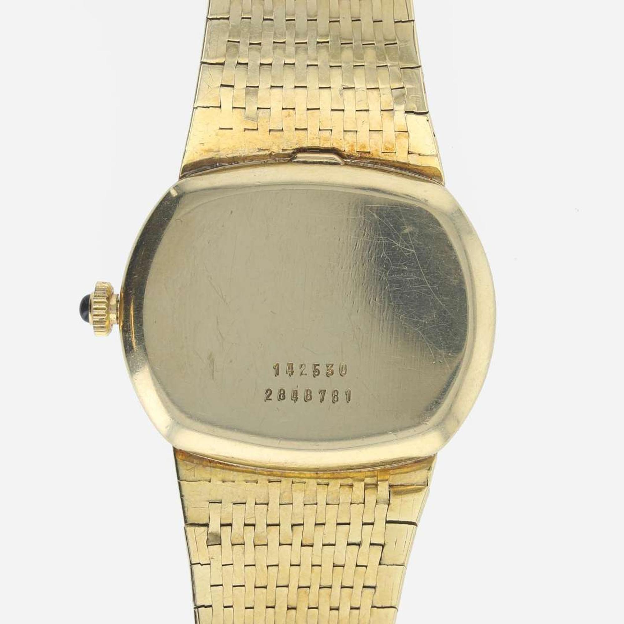 A 14K yellow gold wristwatch, Universal