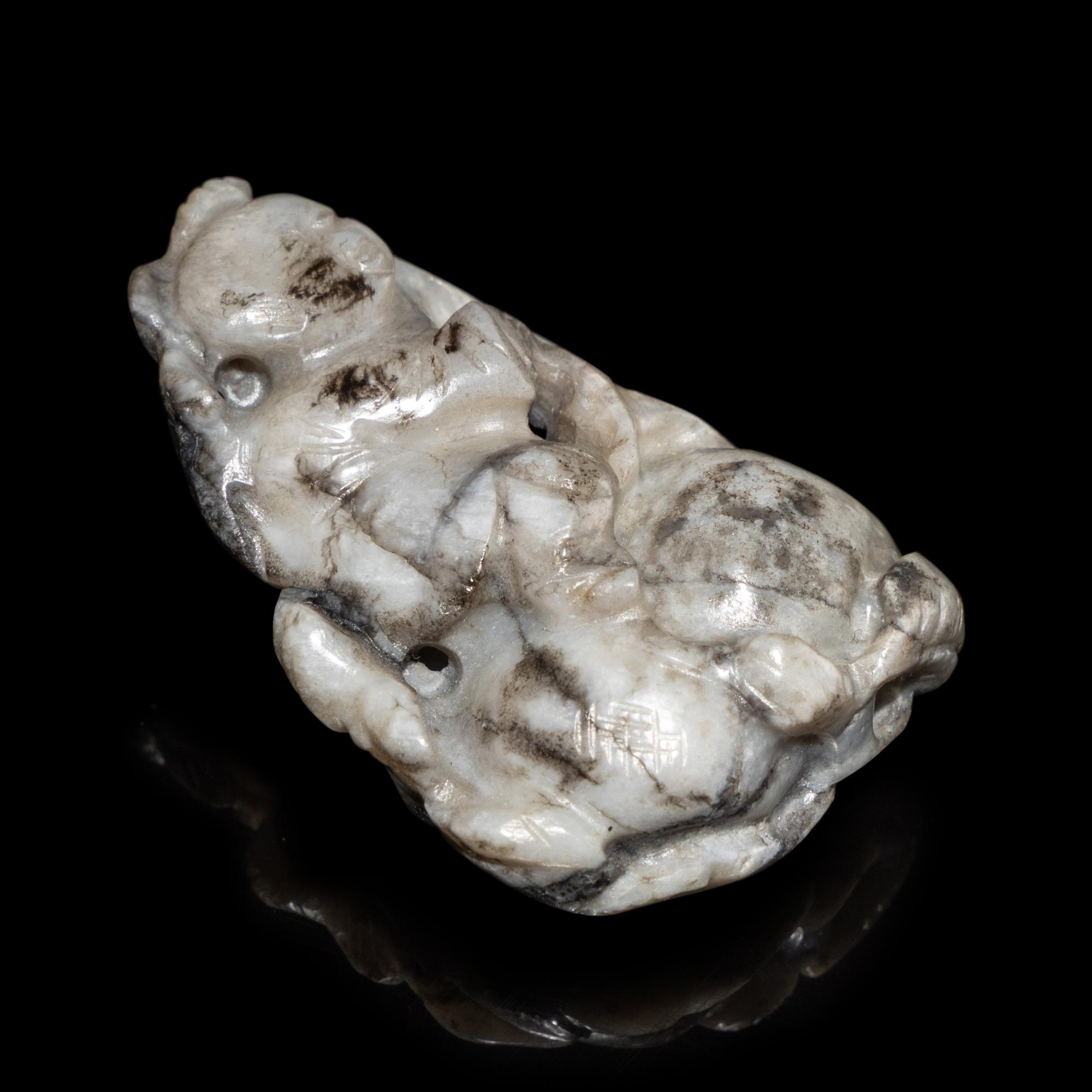 A Chinese Greyish Jade Figure of a Boy, Qing Dynasty — 清 灰玉童子佩