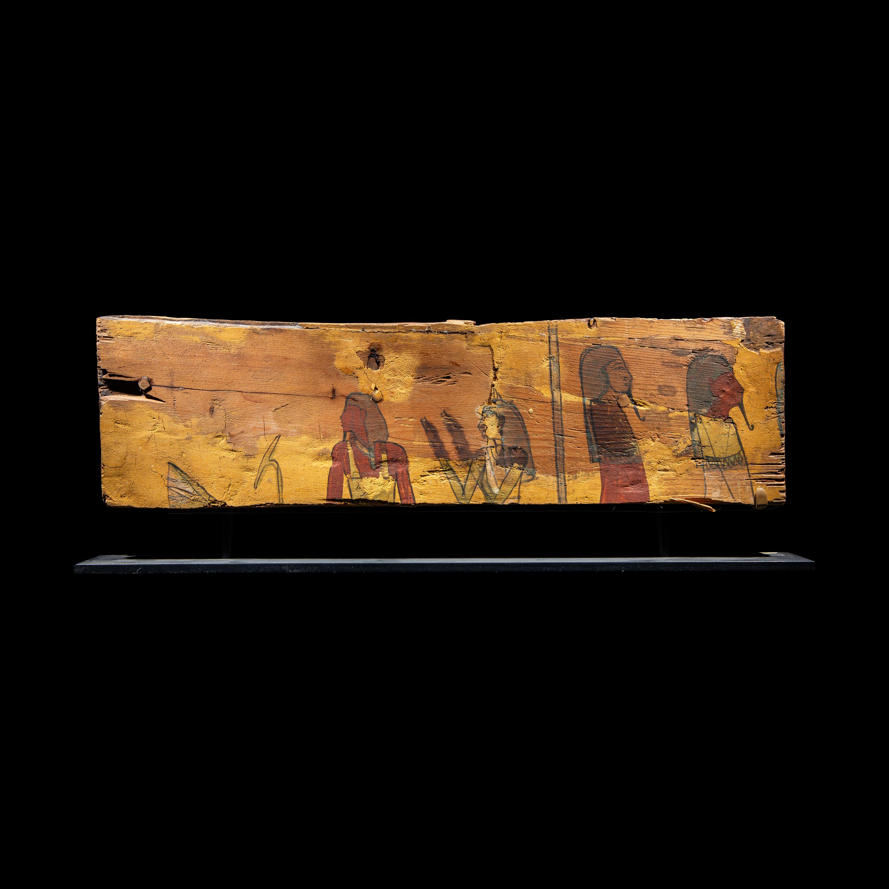 An Egyptian Wood Sarcophagus Fragment