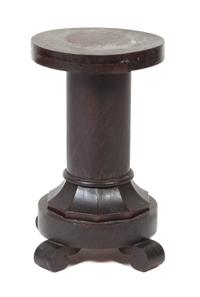 A Wood Low Pedestal Height 20 inches.