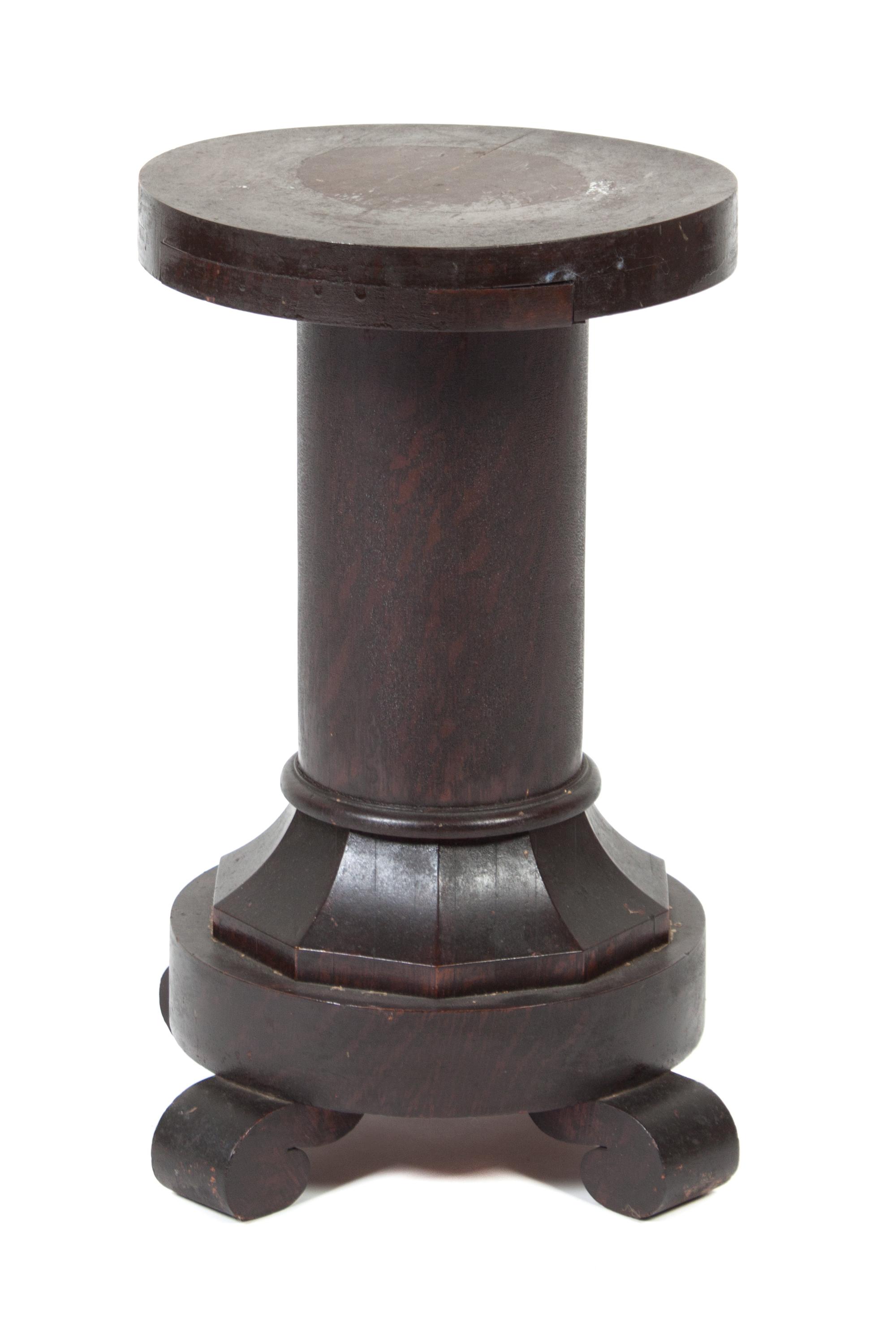 A Wood Low Pedestal Height 20 inches.
