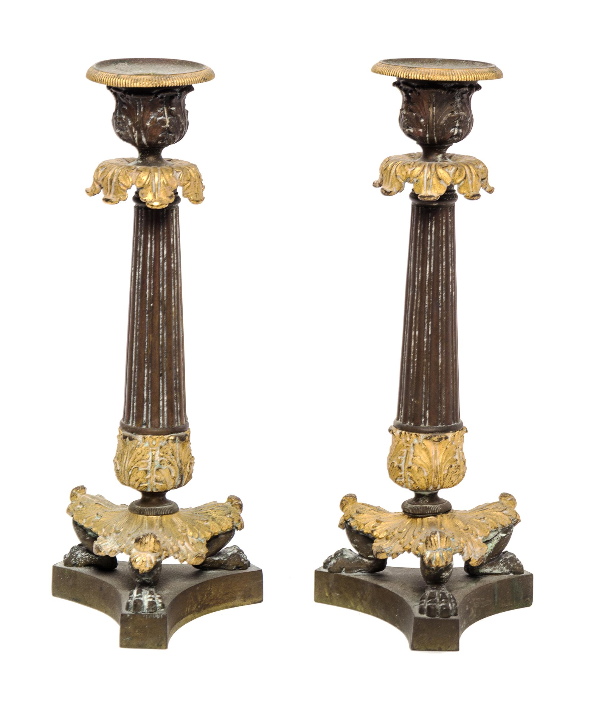 A Pair of Louis Philippe Gilt and Patinated Bronze Candlesticks / 500 A Pair of Louis Philippe Gilt and Patinated Bronze Candle Sticks — 19TH CENTURY