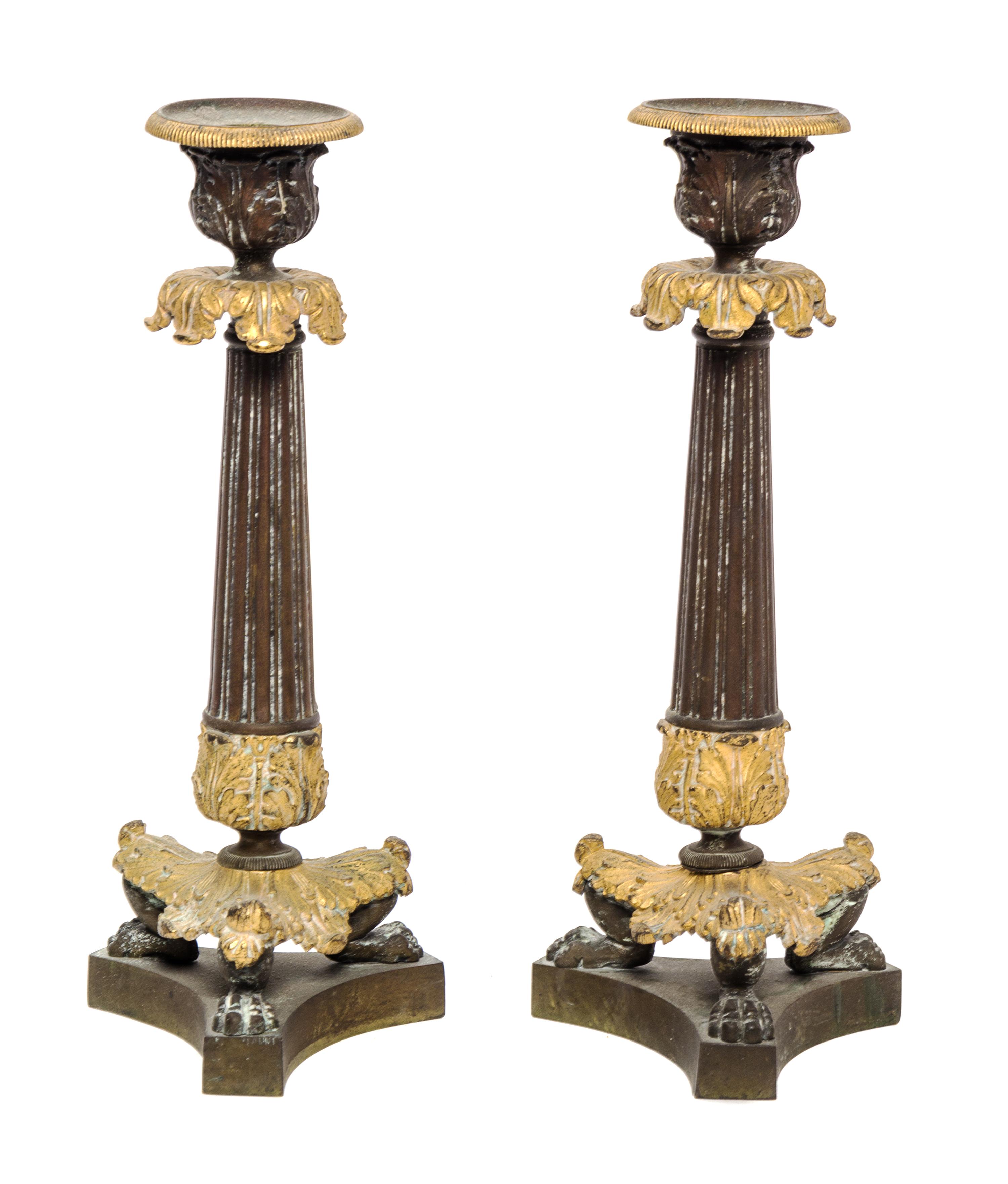 A Pair of Louis Philippe Gilt and Patinated Bronze Candlesticks / 500 A Pair of Louis Philippe Gilt and Patinated Bronze Candle Sticks — 19TH CENTURY