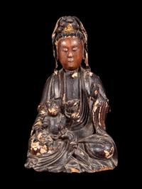 A Gilt Decorated Dark Brown Lacquered Wood Figure of Guanyin and Child