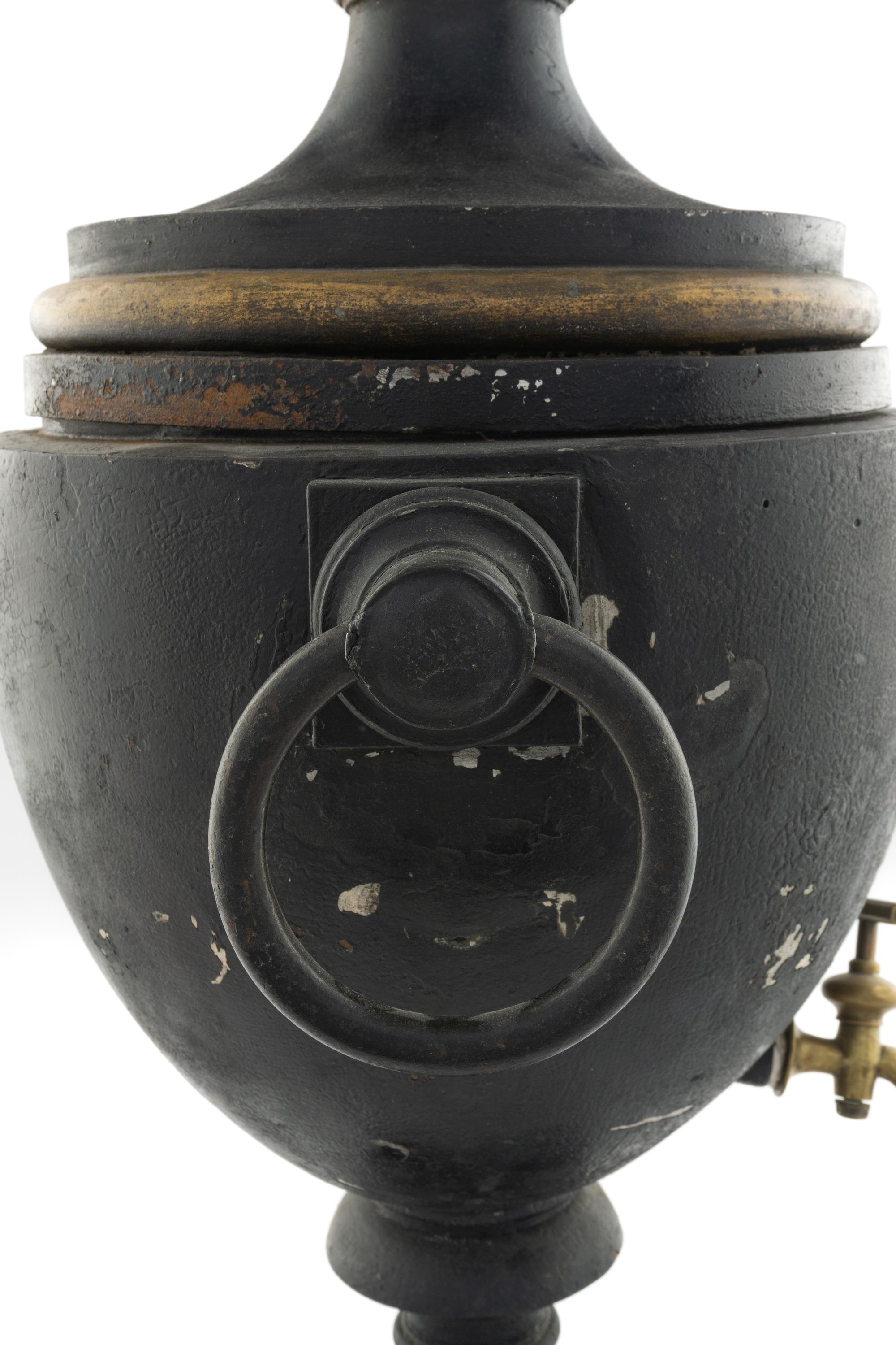 A Large Continental Tole Water Urn