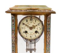 A French Onyx and Champlevé Mantel Clock
