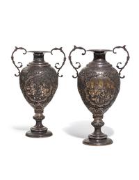 A Pair of Persian Silvered Copper Vases