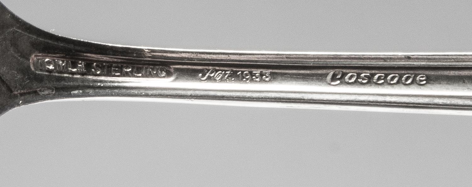 An American Silver Flatware Service, Towle Silversmiths, Newburyport, MA, Cascade pattern, comprising: 12 dinner forks 12 dinner knives