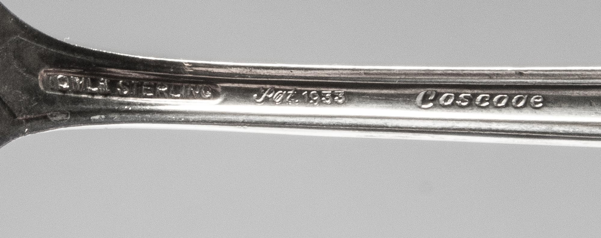 An American Silver Flatware Service, Towle Silversmiths, Newburyport, MA, Cascade pattern, comprising: 12 dinner forks 12 dinner knives