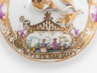 Three Meissen Painted and Parcel Gilt Porcelain Cup and Saucer Sets, a Covered Cup and Two Spoons