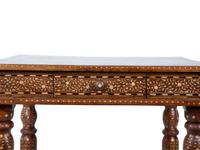An Anglo-Indian Inlaid Teak & Satinwood Game Table