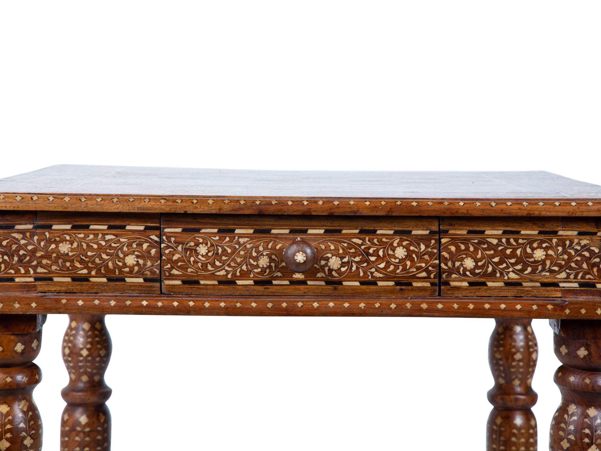 An Anglo-Indian Inlaid Teak & Satinwood Game Table