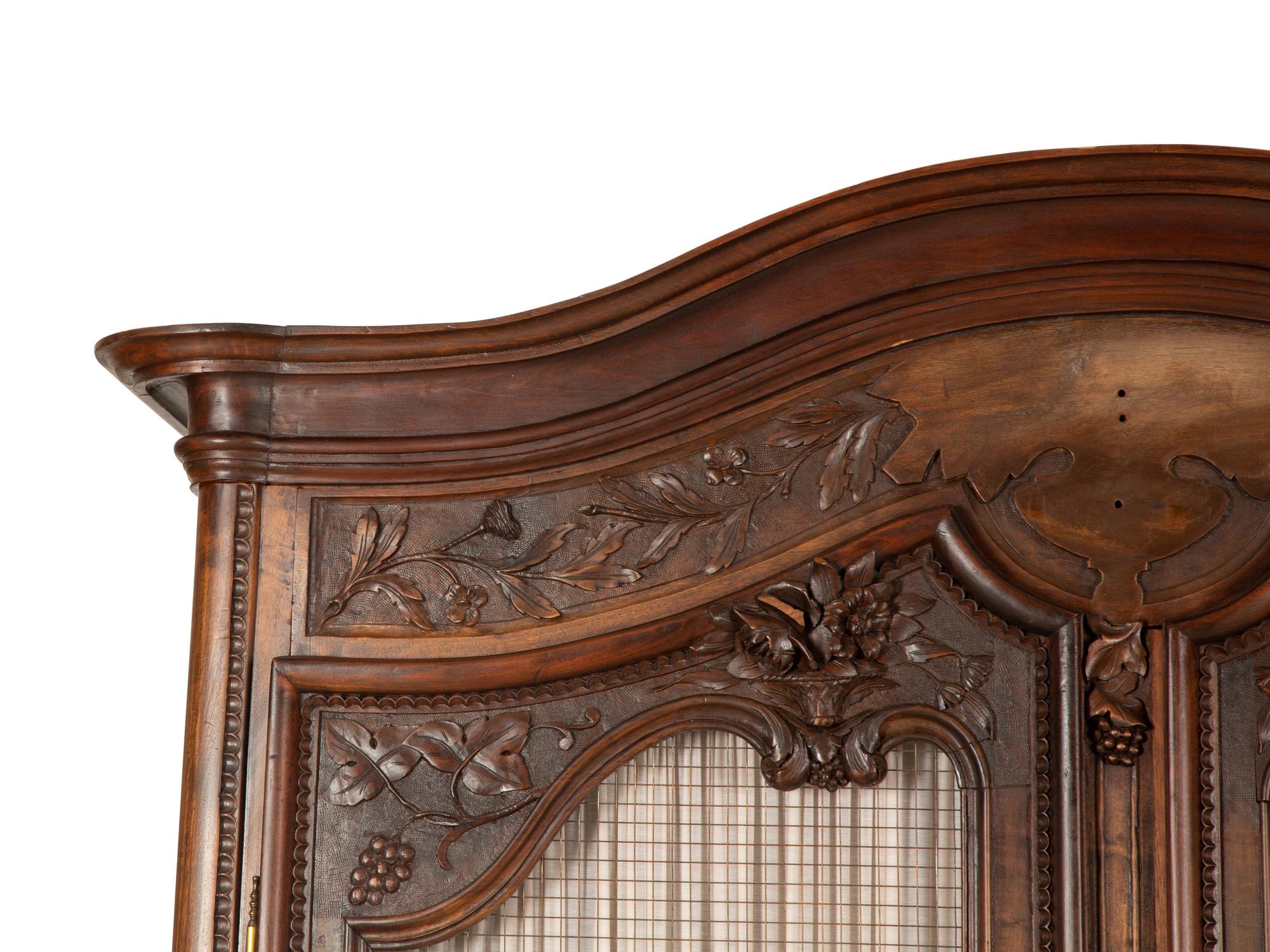 A Louis XV Provincial Style Mahogany Armoire
