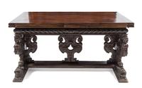 An Italian Baroque Carved Walnut Refectory Table Height 34 1/4 x width 63 3/4 (closed) x depth 36 1/8 inches. — FLORENCE, 16TH CENTURY AND LATER