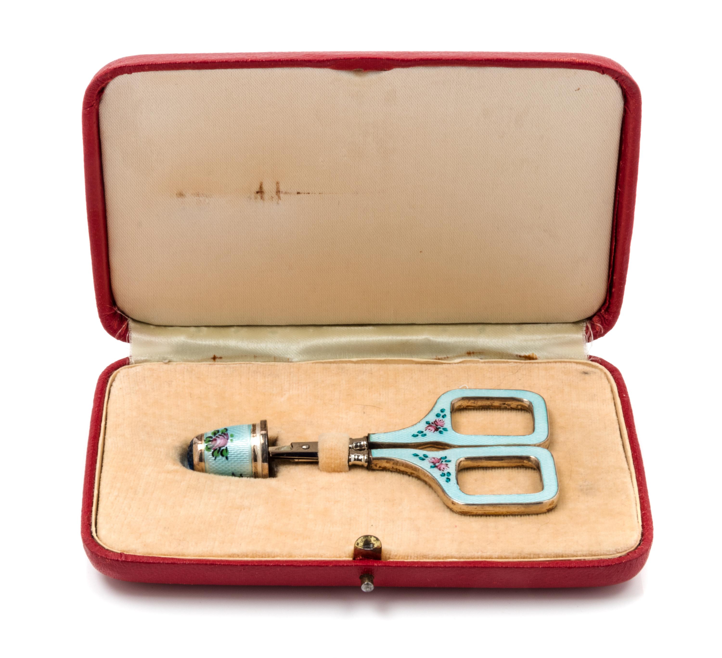 A German Silver and Guilloche Enamel Thimble and Scissors Set, Second Half 20th Century, the thimble having a blue glass top with a pal