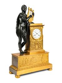 A Restauration Gilt and Patinated Bronze Mantel Clock with Orpheus and a Lyre