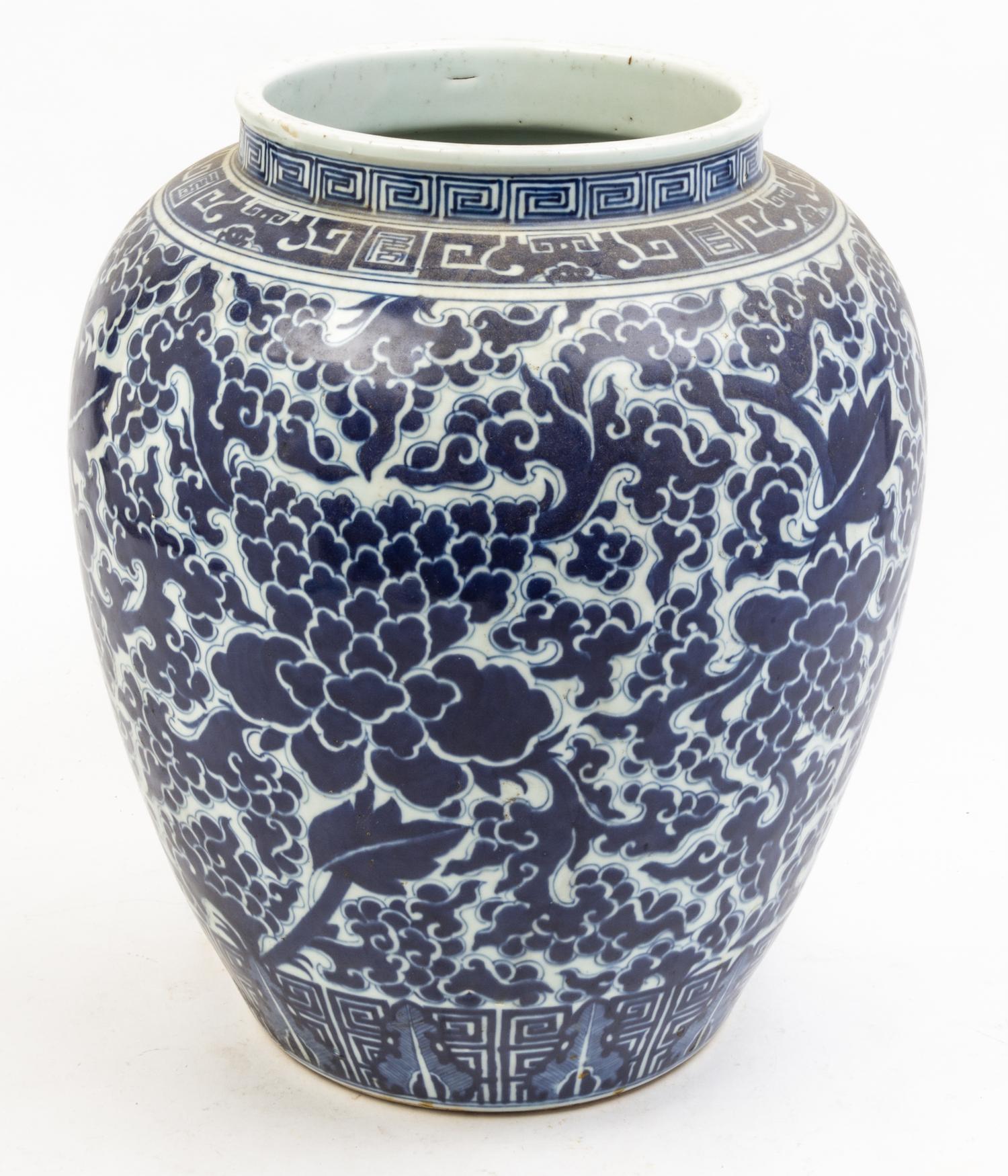 A Pair of Blue and White Porcelain Jars Height 14 1/2 inches.