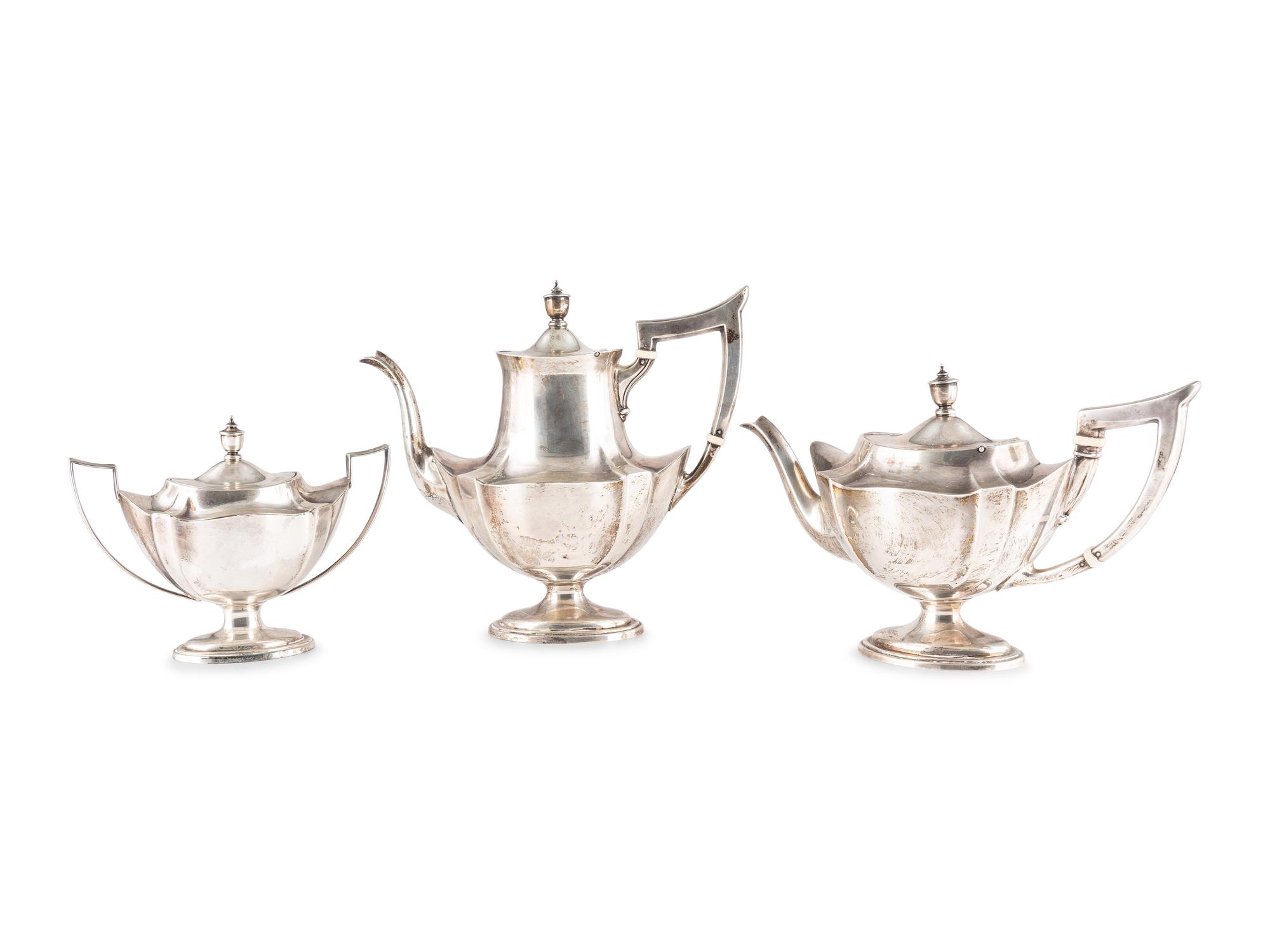 An American Silver Three-Piece Trophy Tea & Coffee Service
