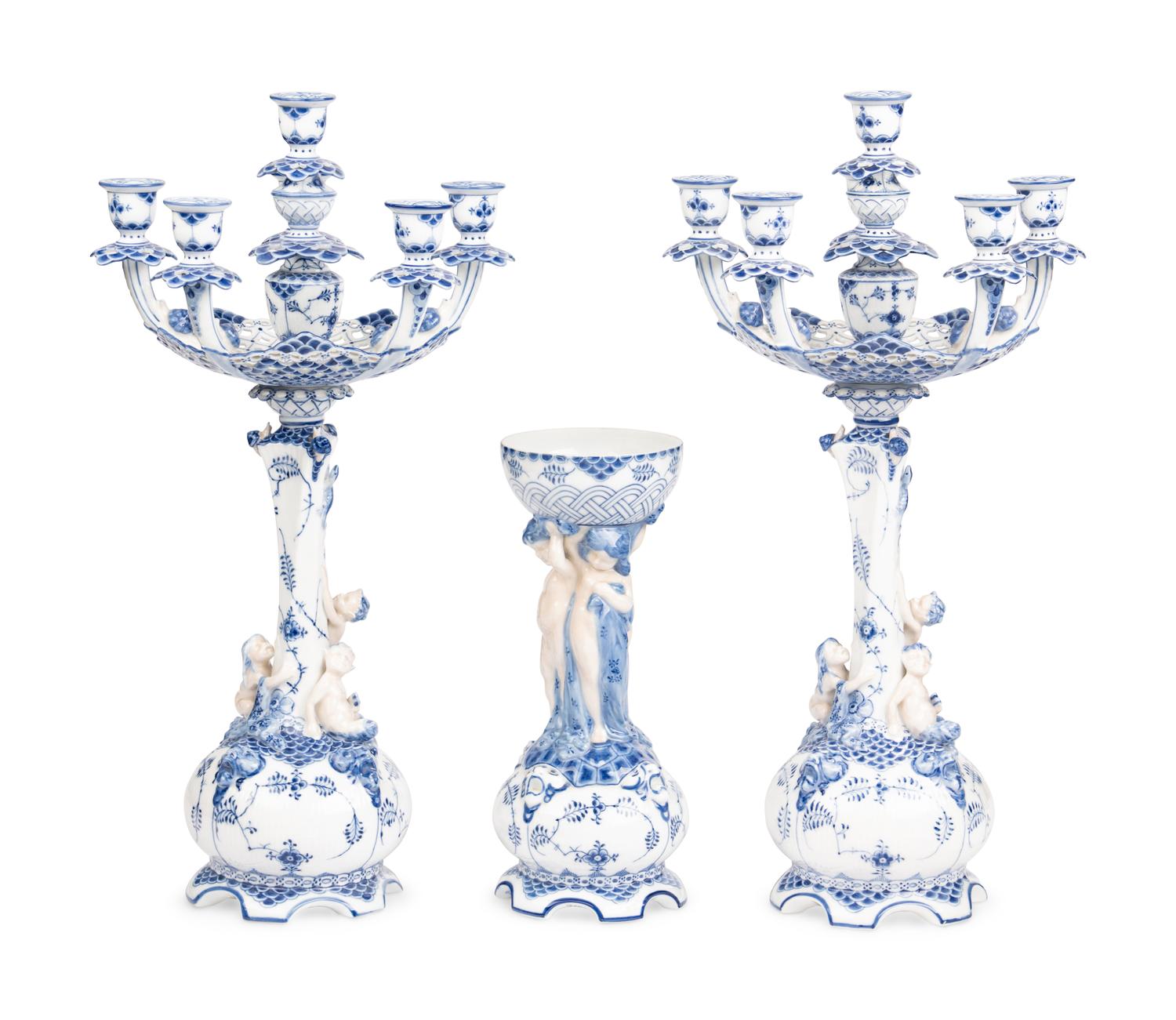 An Assembled Royal Copenhagen Blue Fluted Full Lace Porcelain Table Garniture