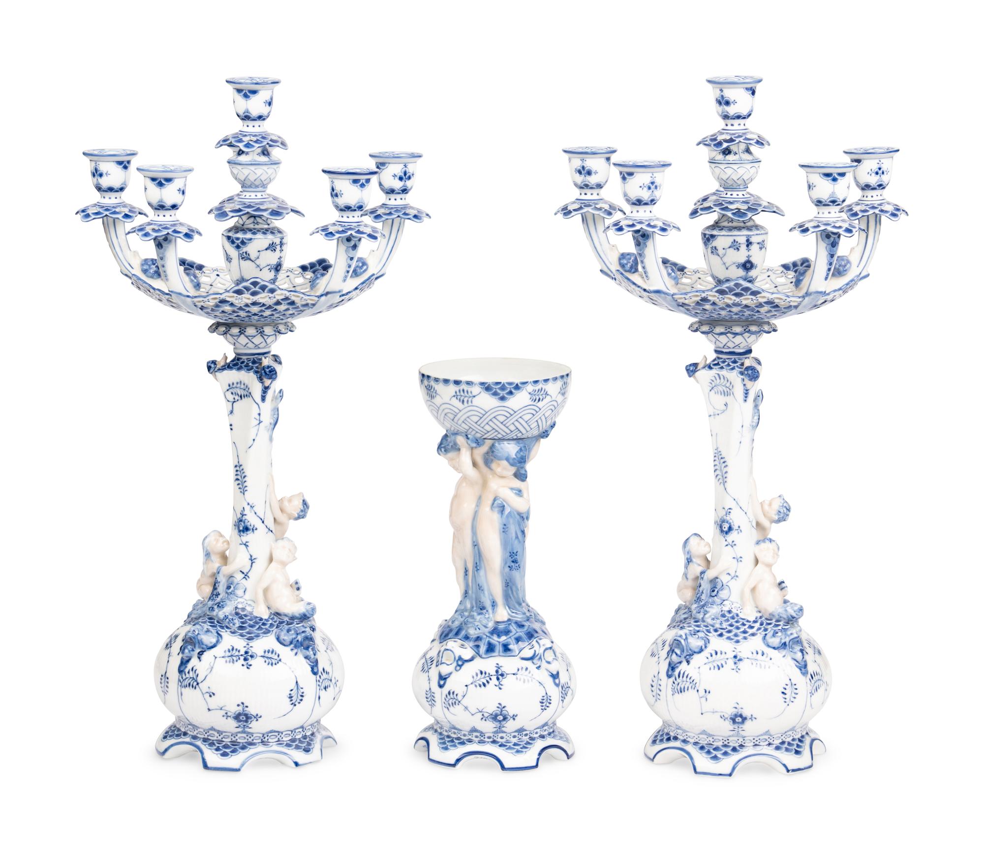 An Assembled Royal Copenhagen Blue Fluted Full Lace Porcelain Table Garniture