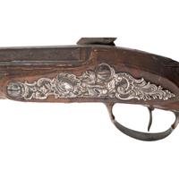 A Pair of Silver Mounted French Percussion Pistols