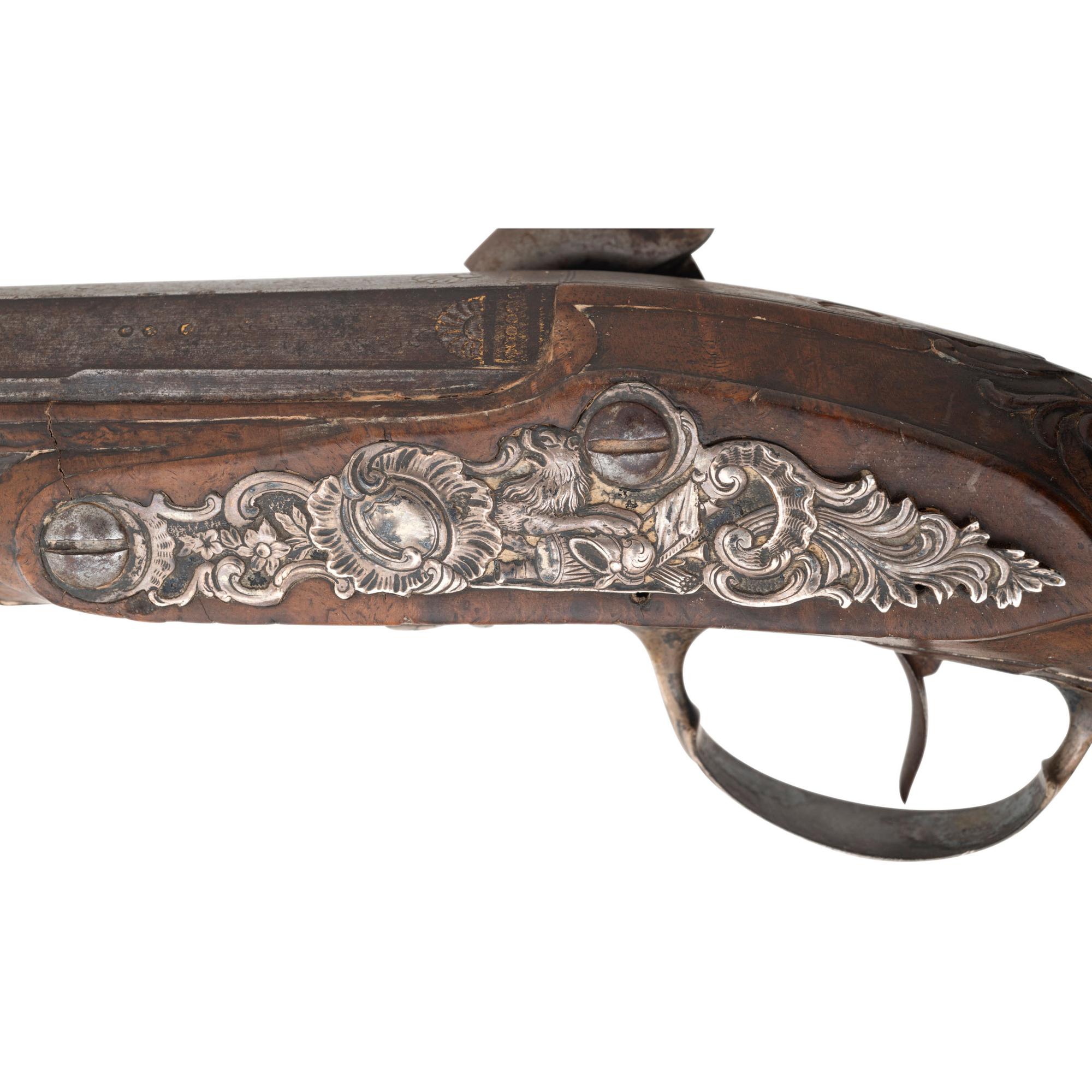 A Pair of Silver Mounted French Percussion Pistols