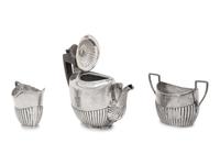 An Assembled Edwardian Silver Three-Piece Bachelor's Tea Service