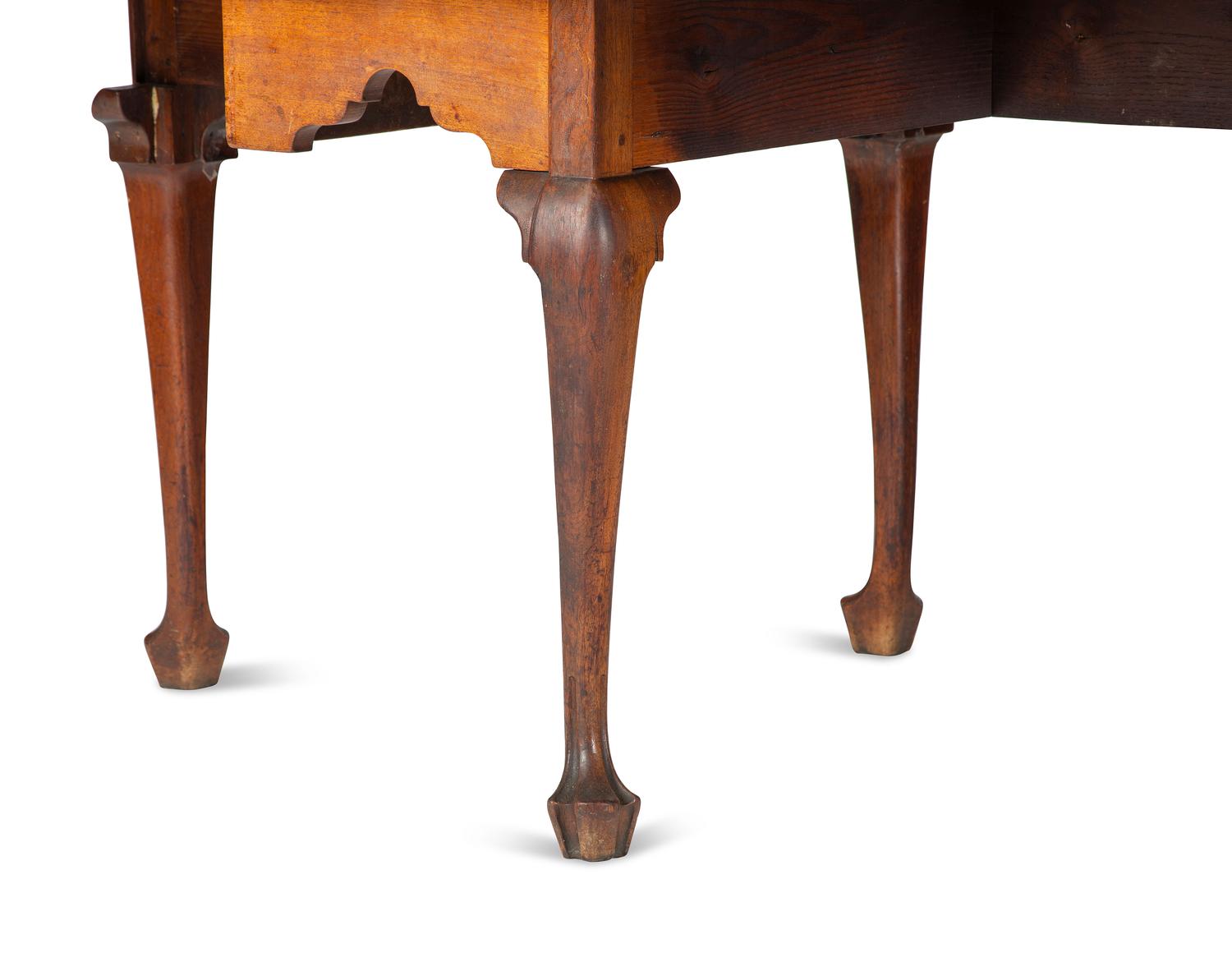 A Queen Anne Carved Walnut Drop-Leaf Dining Table