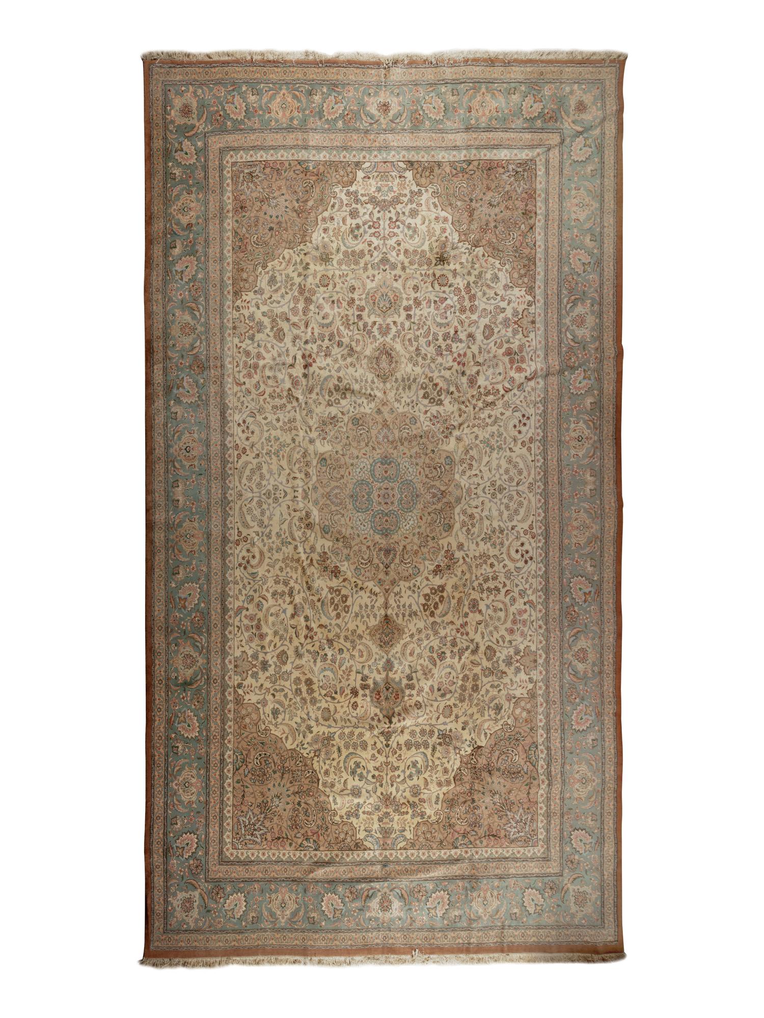A Tabriz Wool Rug