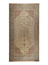 A Tabriz Wool Rug