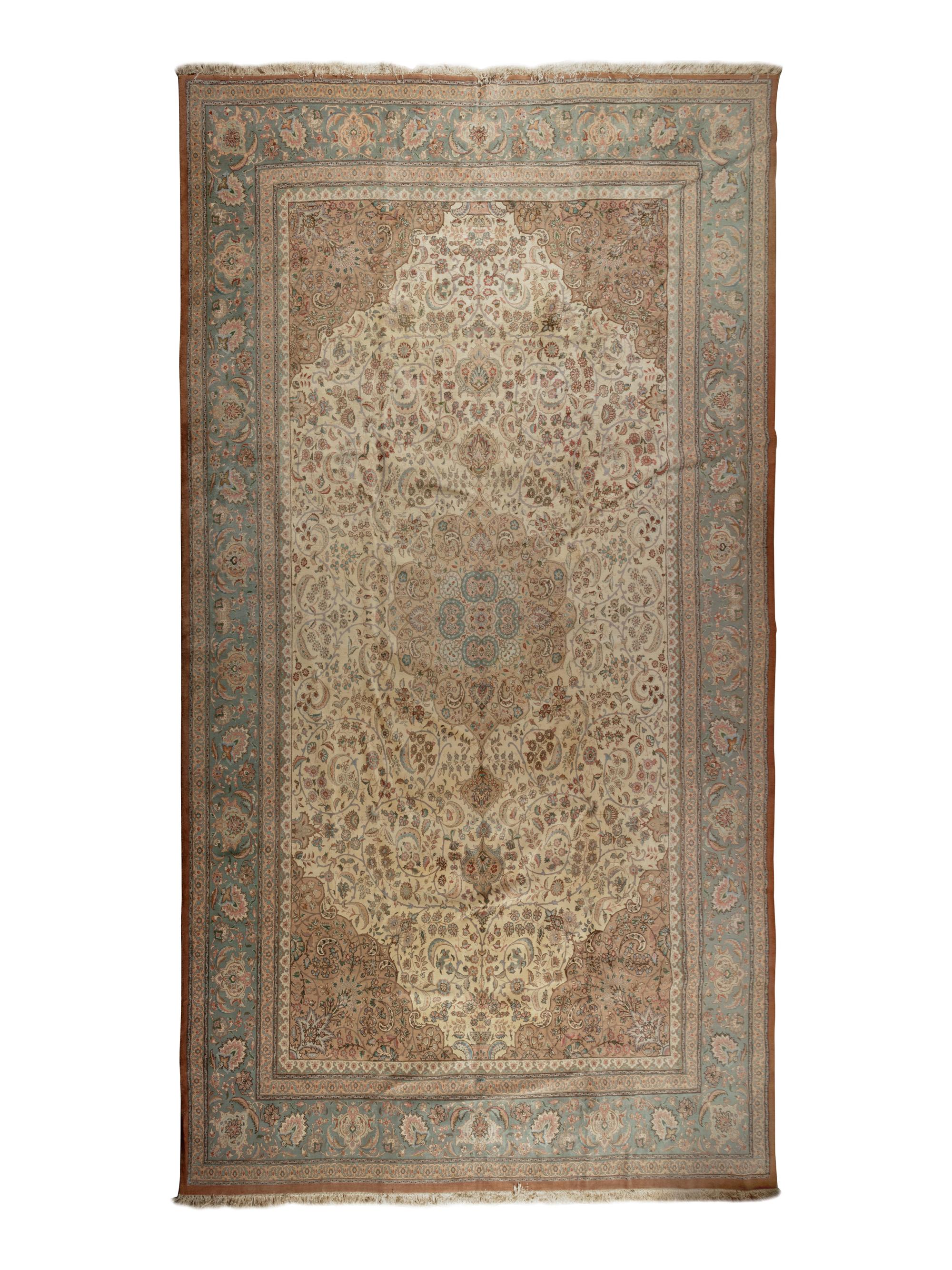 A Tabriz Wool Rug