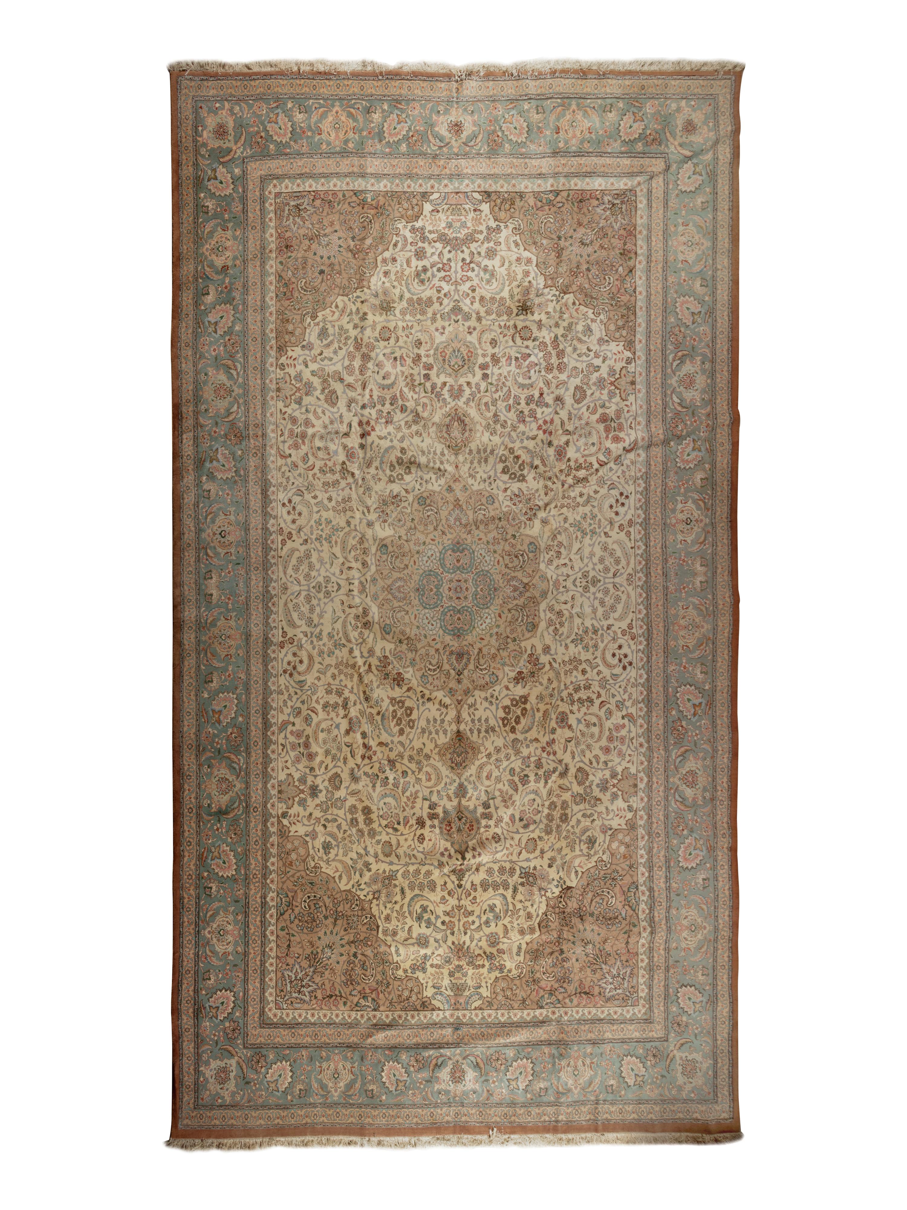 A Tabriz Wool Rug